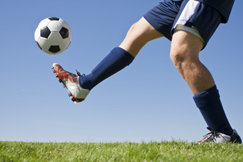 Soccer Injuries model kicking soccer ball