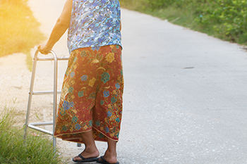 Picture of a patient model using a walker