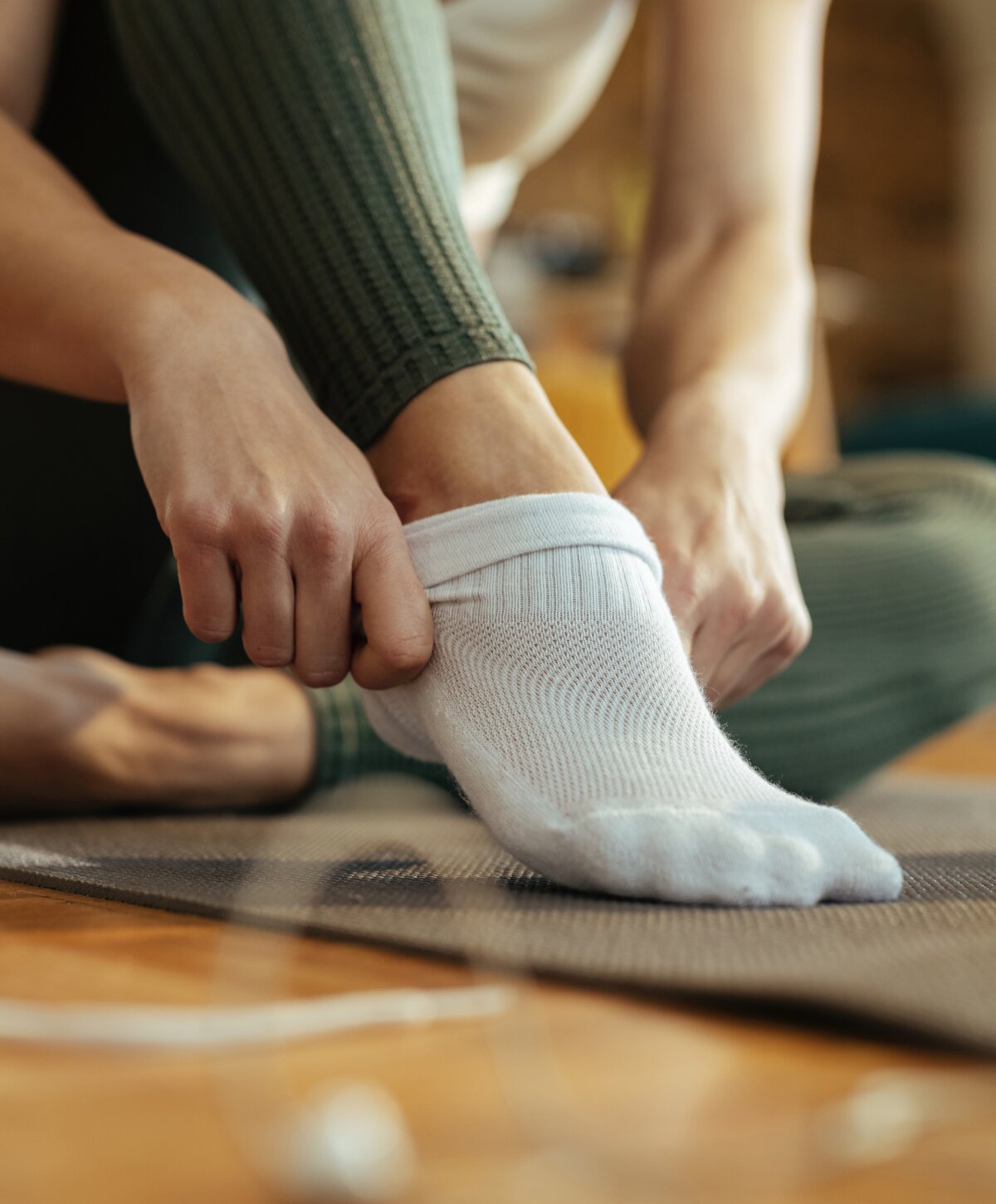 Ann Arbor total ankle replacement model putting on socks